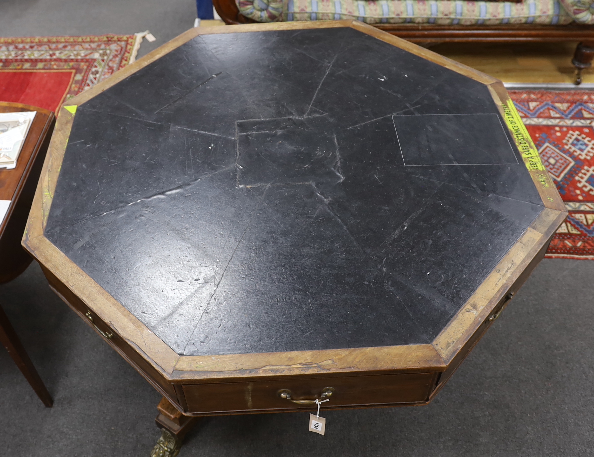 A George IV octagonal mahogany drum library table, width 130cm, height 77cm